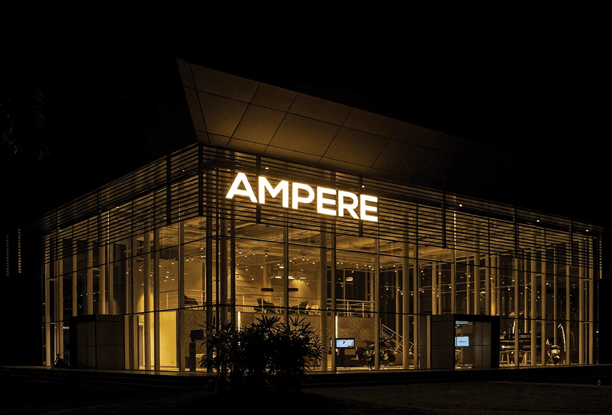 Ampere dealership showroom at night