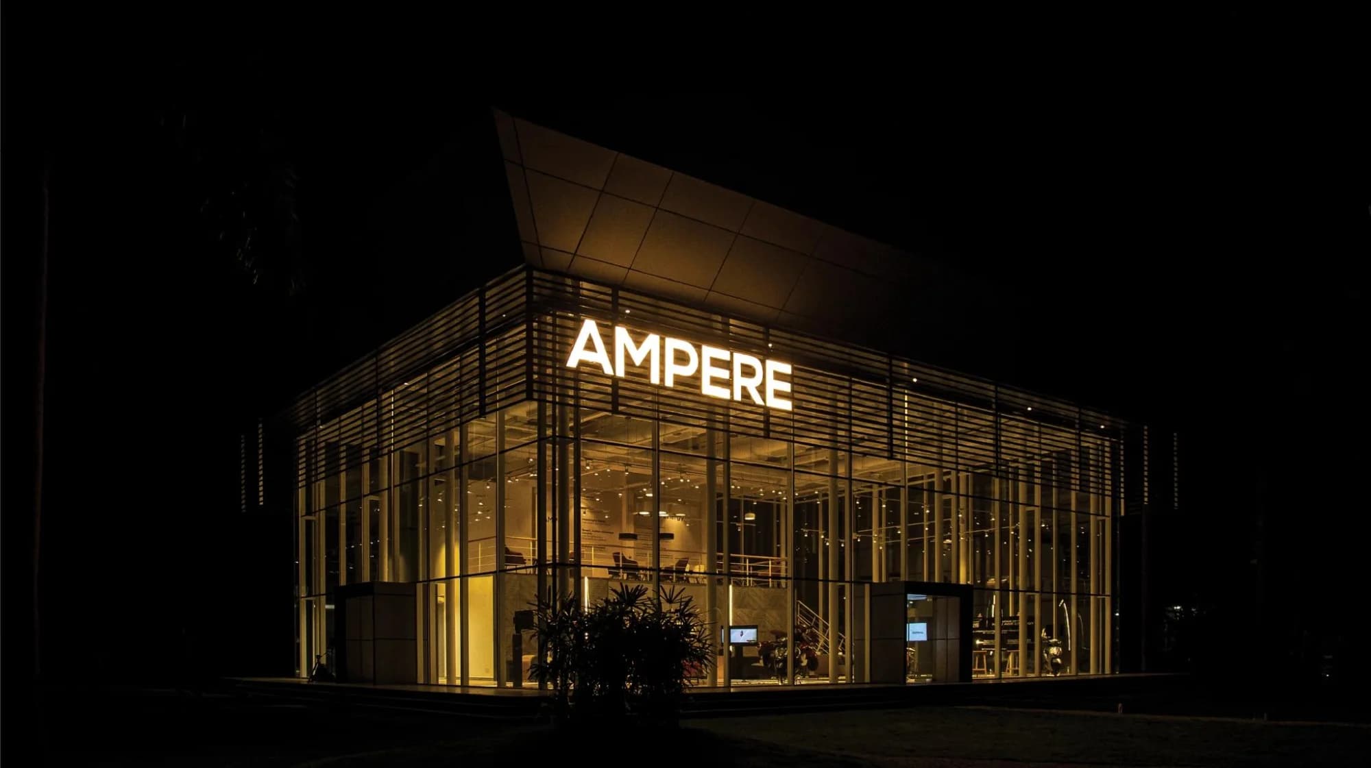 Ampere branded building at night